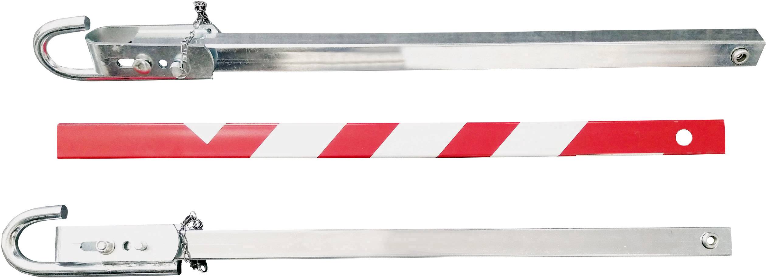 Three metal bars, two made of steel, one red and white striped, possibly used for cordoning off areas.