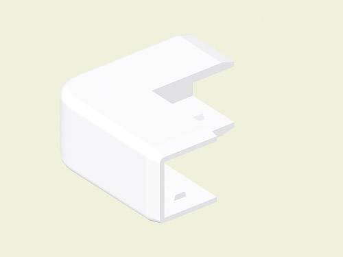 A white plastic corner protector covering the end of an angular object. The background is a pale green.