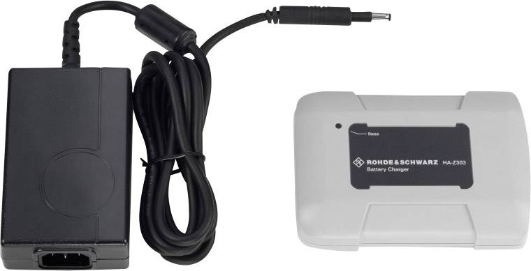 Battery charger with two components: black power supply with cable and white battery charger with 'Rohde & Schwarz - HU-2203' inscription.