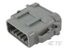 A grey, rectangular electronic connector with multiple ports. The company logo 'TE' is visible on the bottom right-hand side.