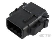 The image depicts a black electrical connector with a rectangular shape and multiple ports.