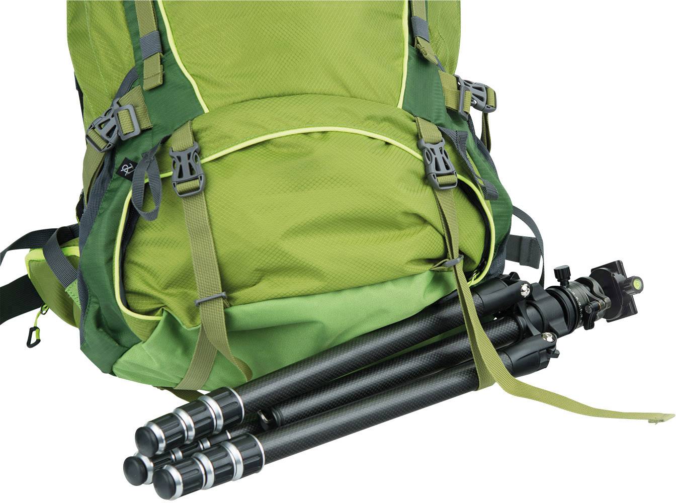 A green rucksack with a tripod attached to its side, against a white background.