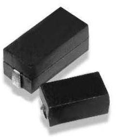 Two rectangular black electronic components, lying side by side, with silver connections on their sides.