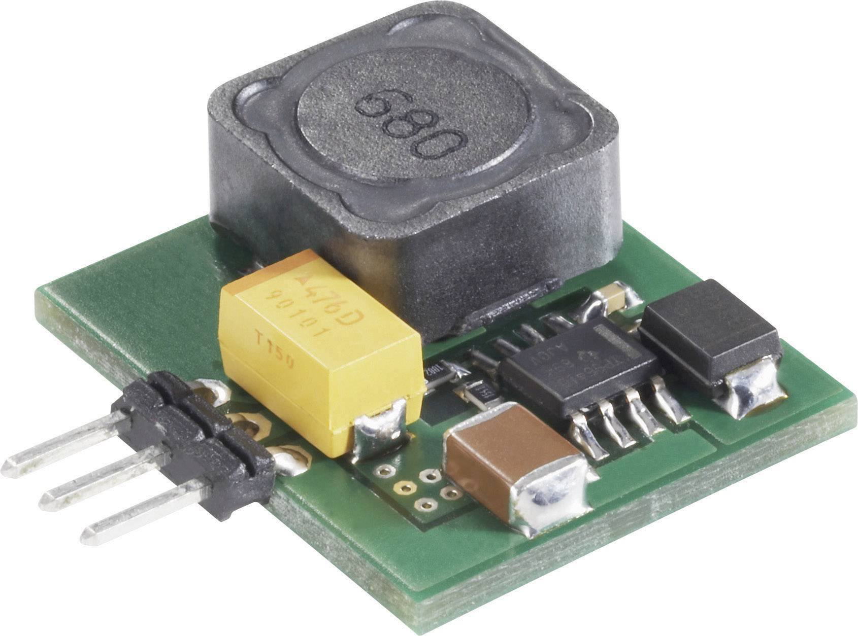 Printed circuit board with electronic components: coil, capacitor, IC and pin contacts. Main component for an electronic circuit.