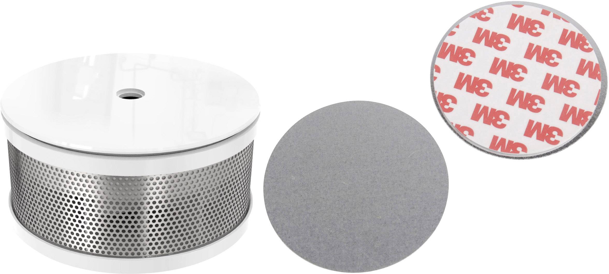 Round, white smoke detector with a perforated edge. Beside it two circular stickers, one grey, the other with a red '3M' logo.