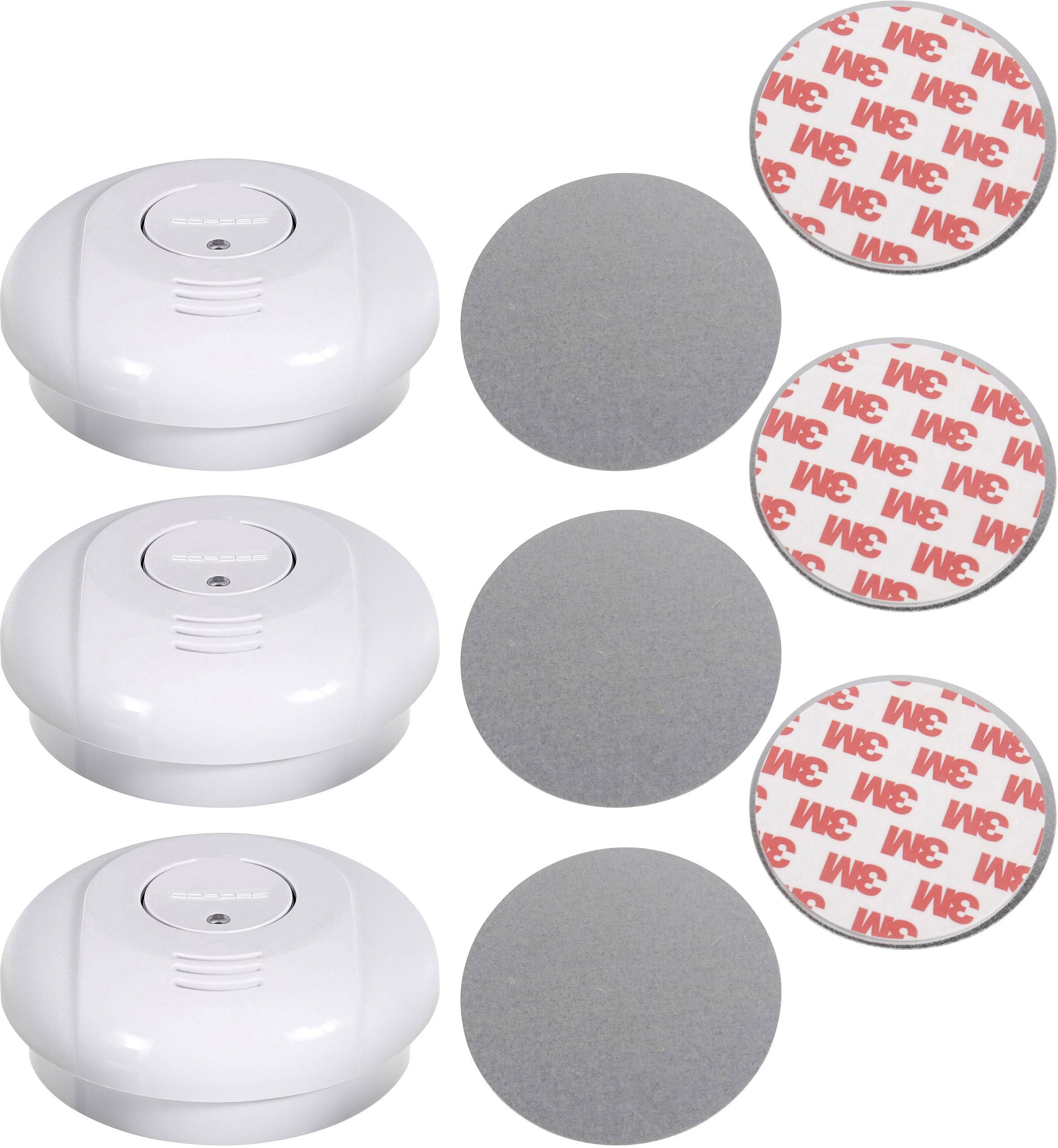 Three smoke detectors, each with a grey magnetic pad and double-sided 3M adhesive strip. Ideal for ceiling mounting without drilling.