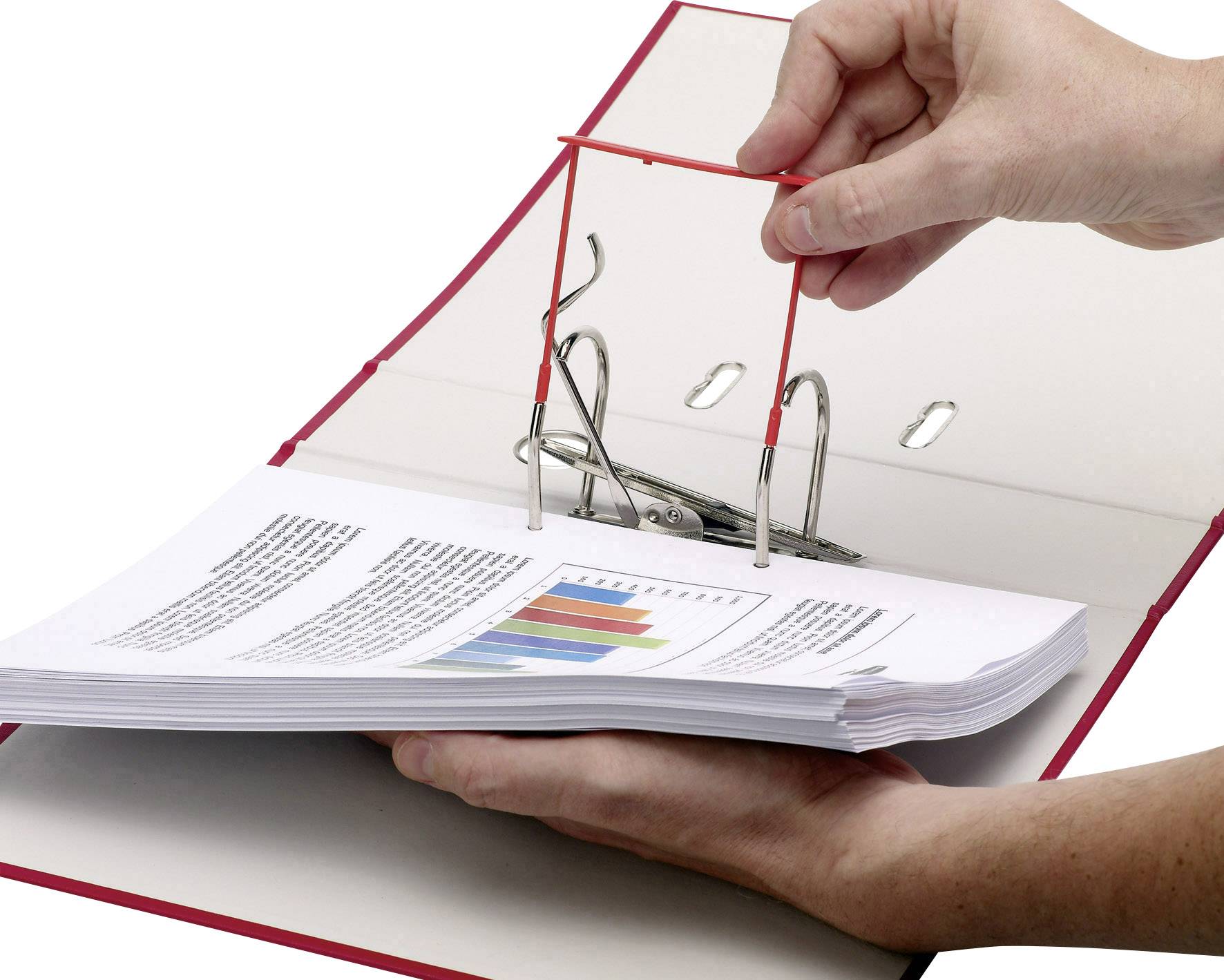 A hand opens the metal lever of a red file folder, in which documents with text and a coloured bar graph are stored.