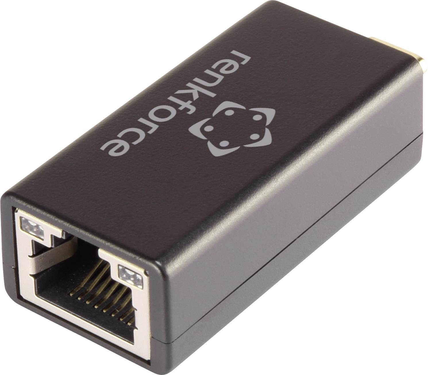 A black network adapter with an Ethernet port, lying on its side on a light surface.