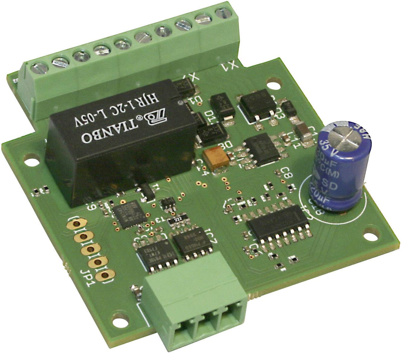 A green electronic circuit board with electronic components such as capacitors, resistors, and connectors.