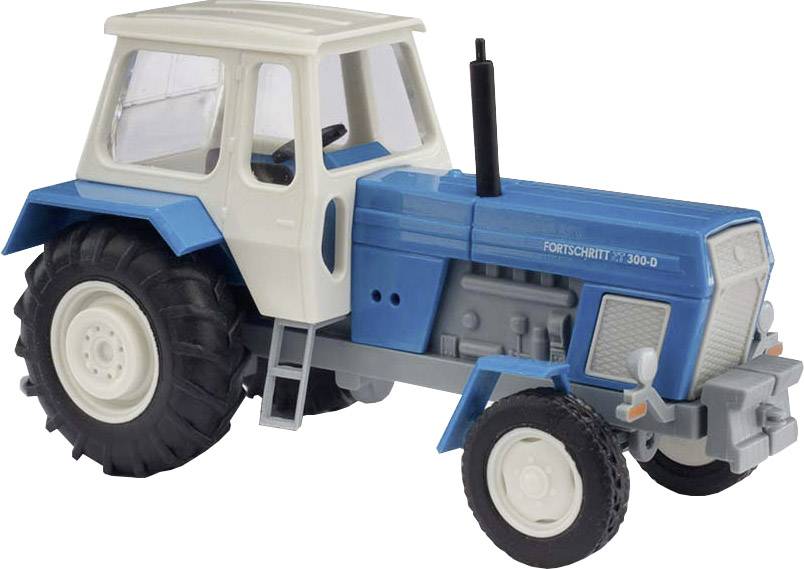 Toy model of a 'Fortschritt ZT-300-D' tractor in blue and white, with large black tyres and windows in the cab.