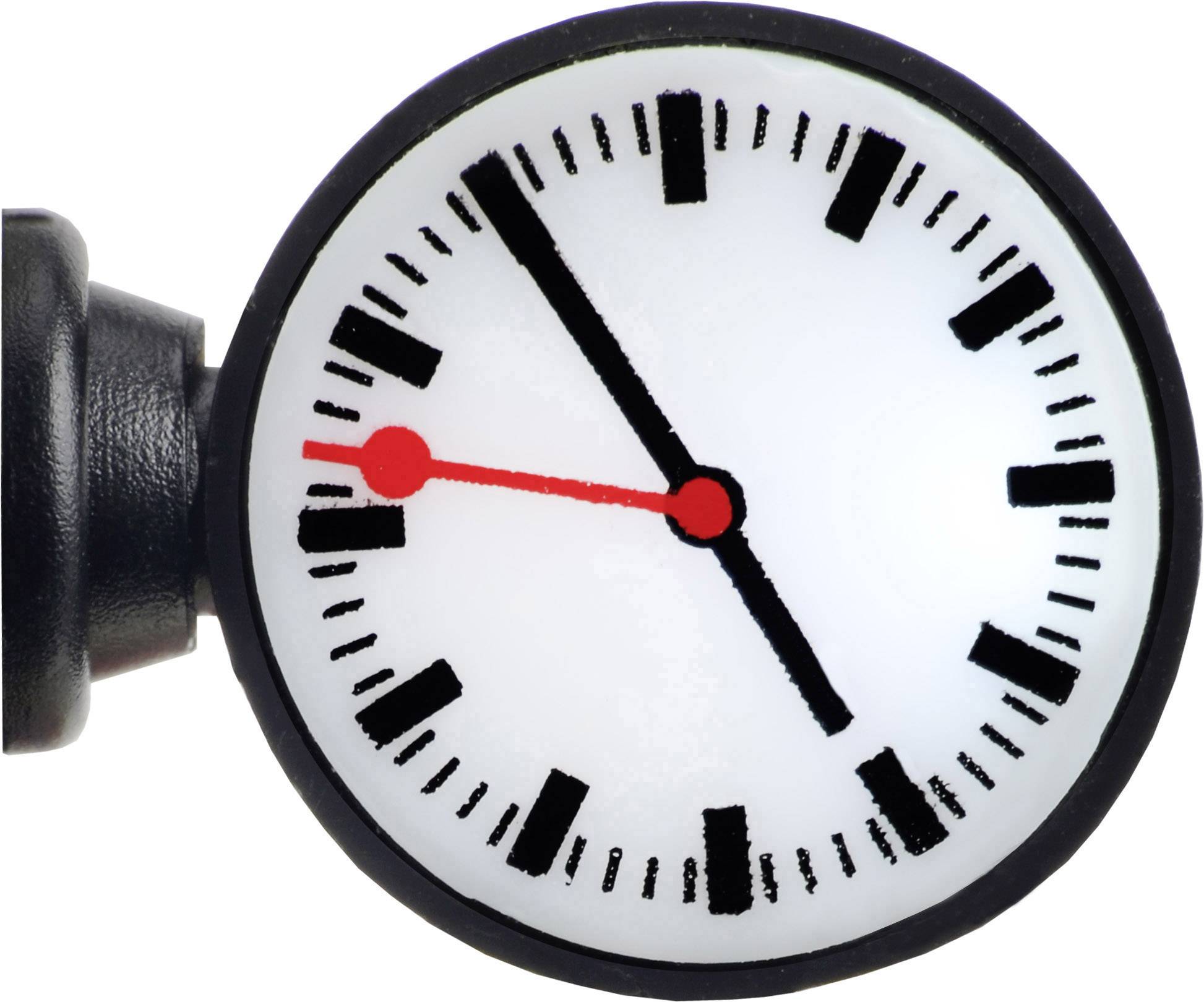 A round station clock with a white dial, black hour and minute markings, and red hands pointing to four o'clock.