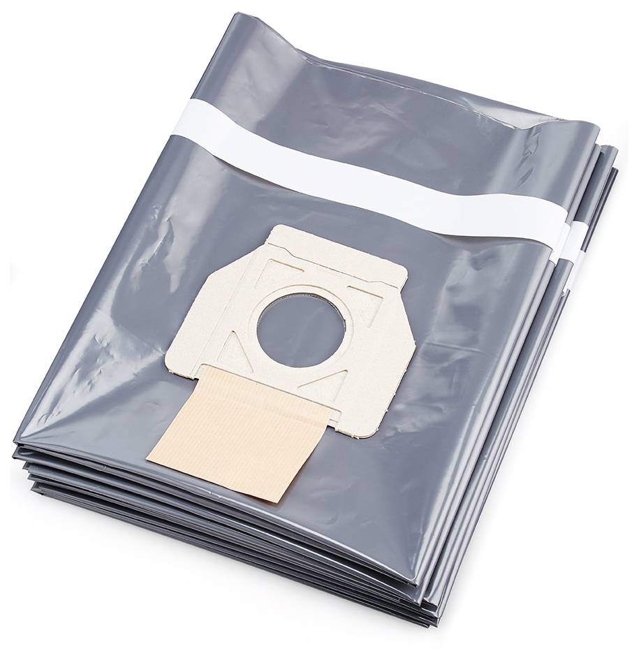 A stack of grey vacuum cleaner bags made of non-woven material, with a round connector in the middle, ready for replacement.