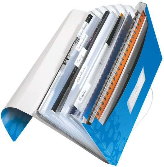 Open blue ring binder with multiple clear pockets, containing various documents and notebooks neatly organised.