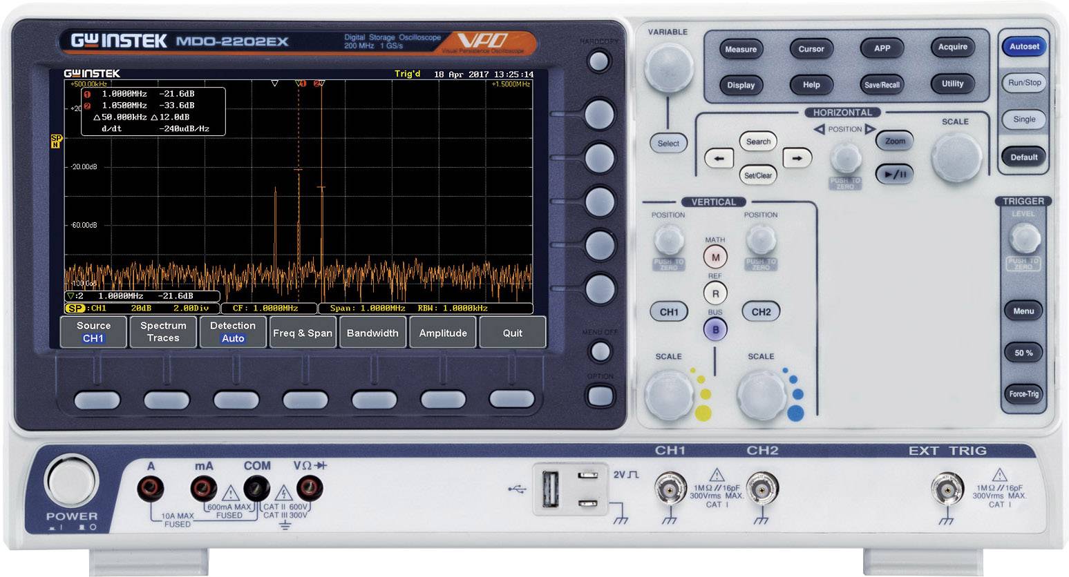 Oscilloscope with frequency spectrum display. On the left is a screen with waveforms, on the right are control buttons and connections.