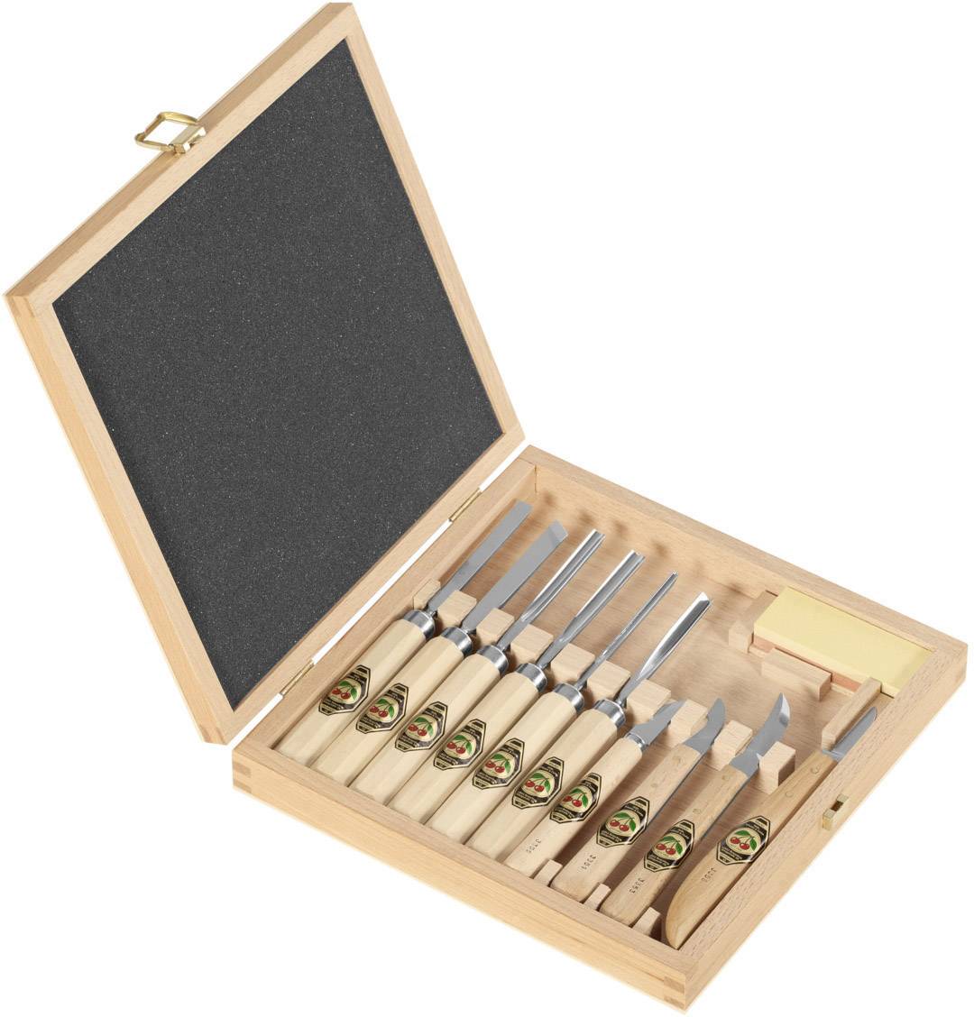 An opened wooden box containing ten wood carving tools. Each tool has a wooden handle and a sharp metal blade.