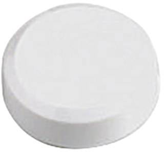 A round, white tablet in close-up.