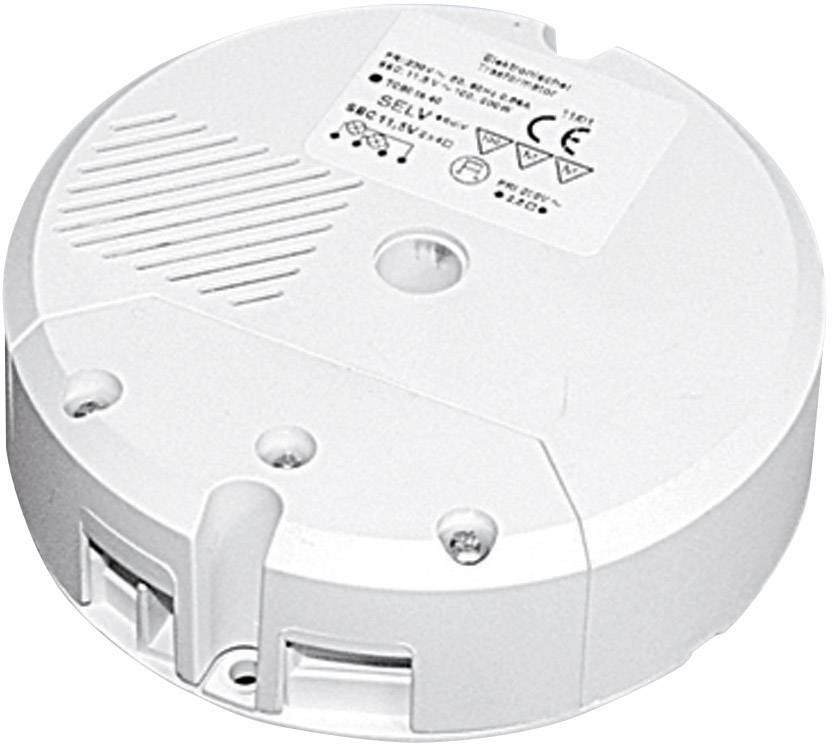 A round, white electric transformer with a label displaying technical information and safety markings.