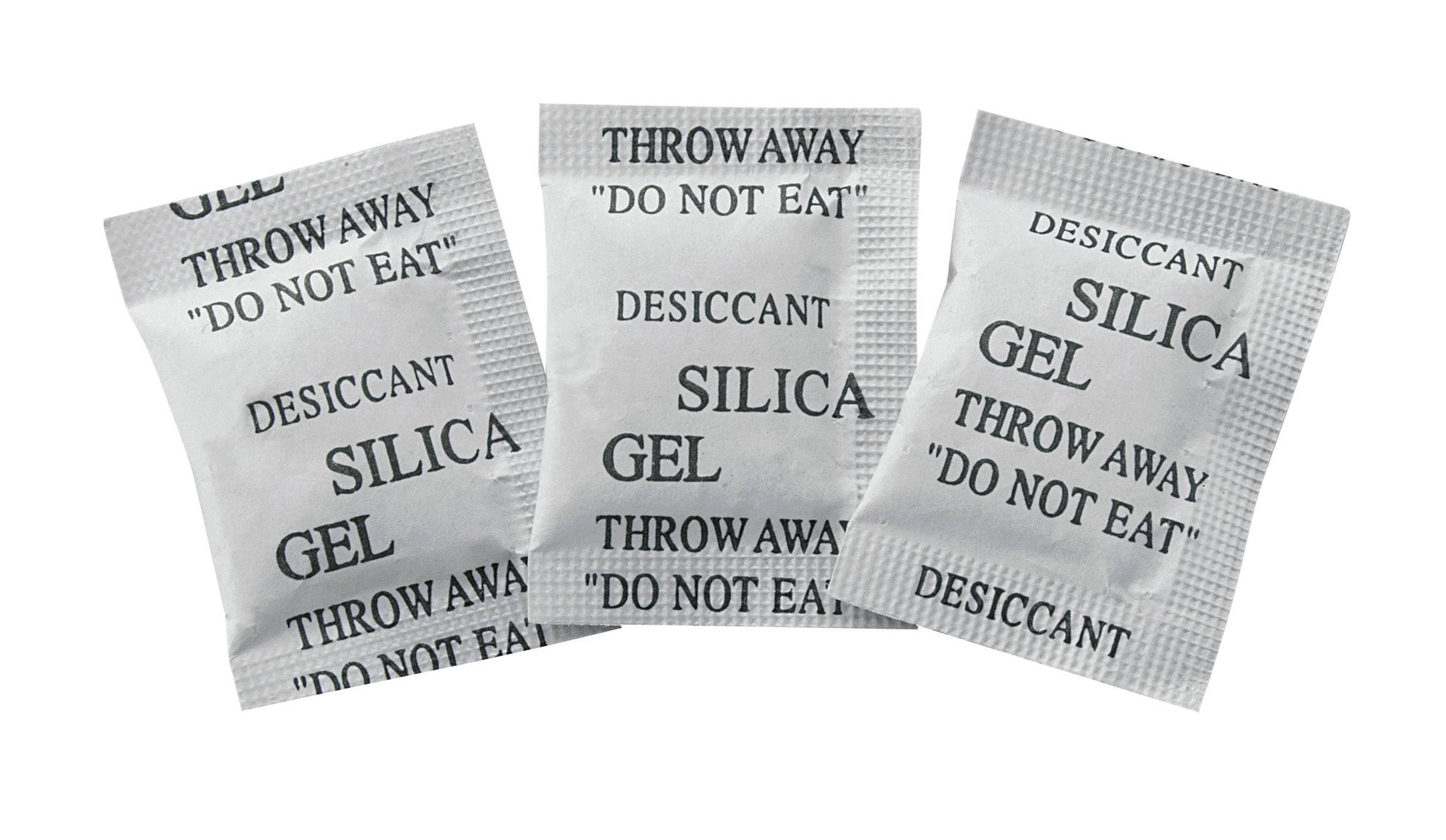 Three silica gel desiccant sachets printed with 'Do Not Eat' and 'Throw Away'.