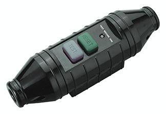 A black electric switch with two buttons, 'Test' in purple and 'Reset' in green, for device safety testing.
