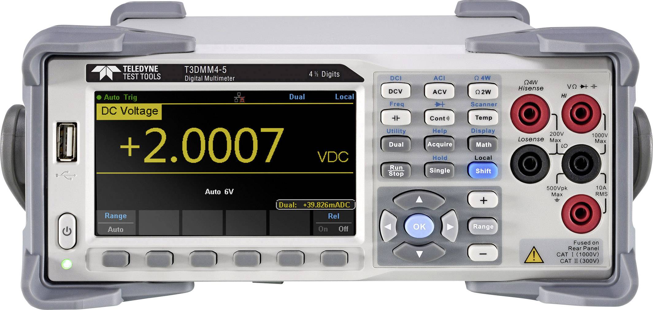Digital multimeter on a table showing 'DC Voltage +2.0007 VDC' on a screen. Device has various buttons and ports.