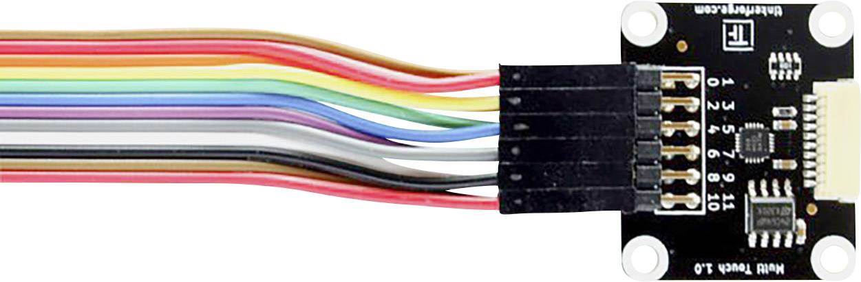 A flat ribbon cable with various coloured wires is connected to a small, black electronic circuit board.