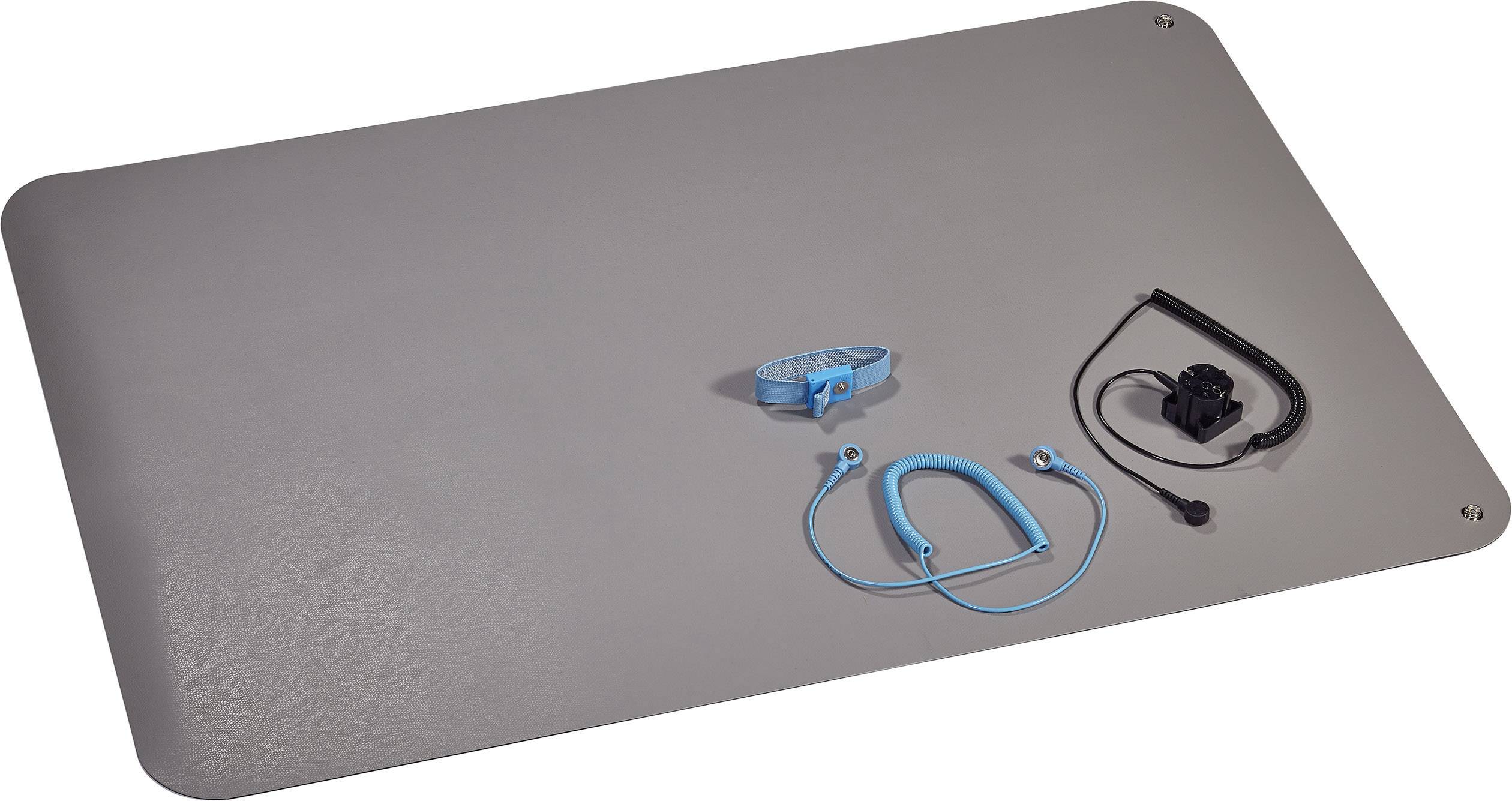 A rectangular, grey mat with a blue ankle tag, blue in-ear headphones, and a black buckle on the surface.