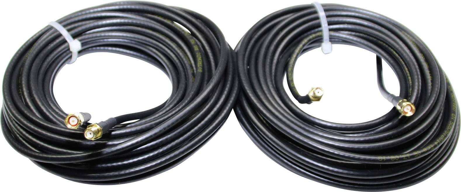 Two black coaxial cables with gold-plated connectors, each wound into a coil, lie side by side.