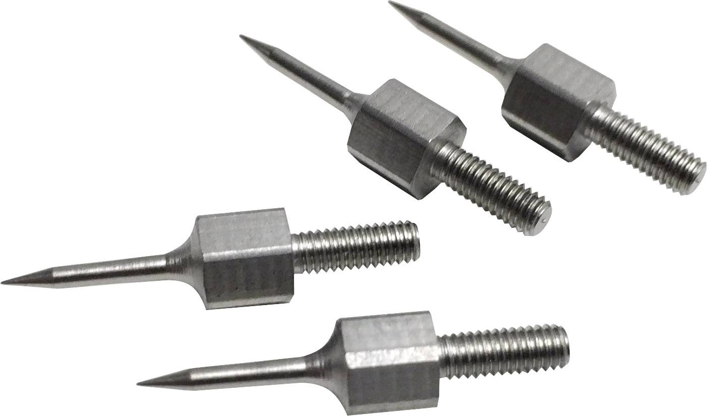 Four silver, sharp-pointed metal tools with screw threads. They are evenly arranged and appear to be made of stainless steel.