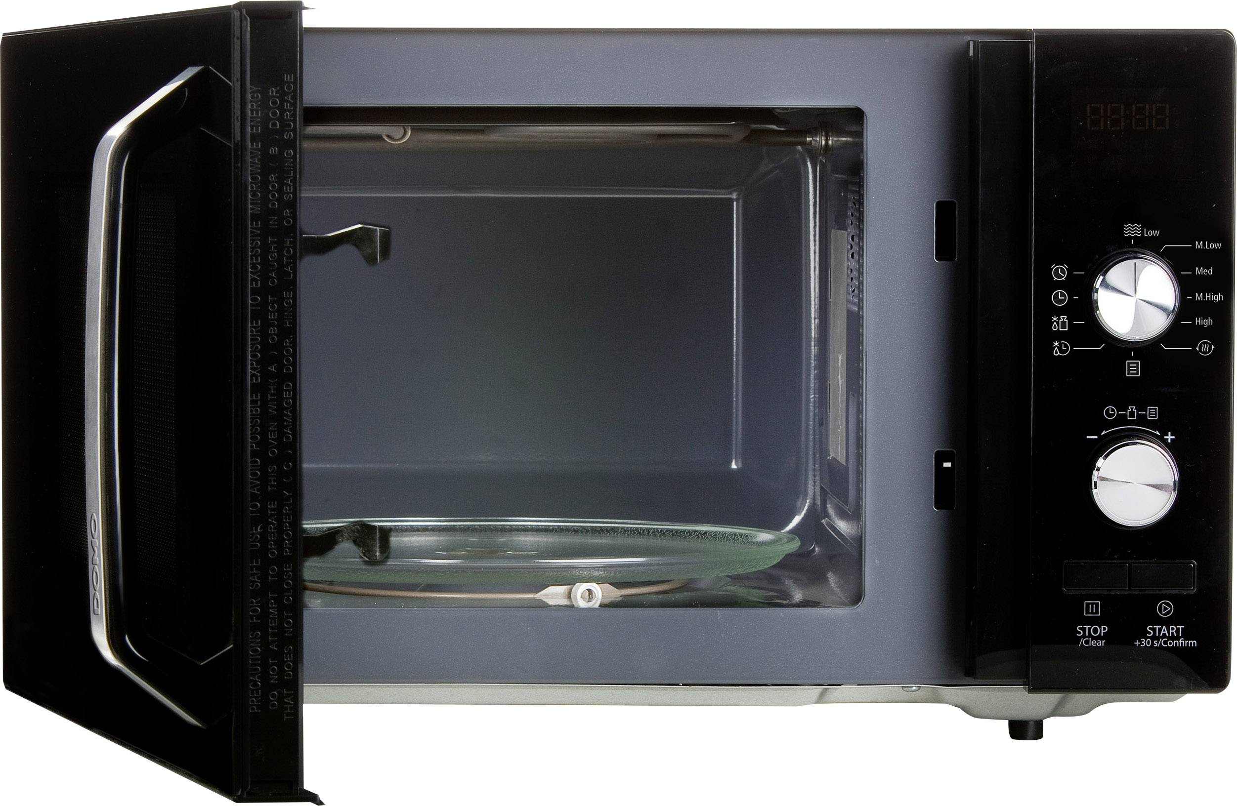 Microwave with an open door, showing the interior with a turntable. Control panel with buttons and display on the right-hand side.