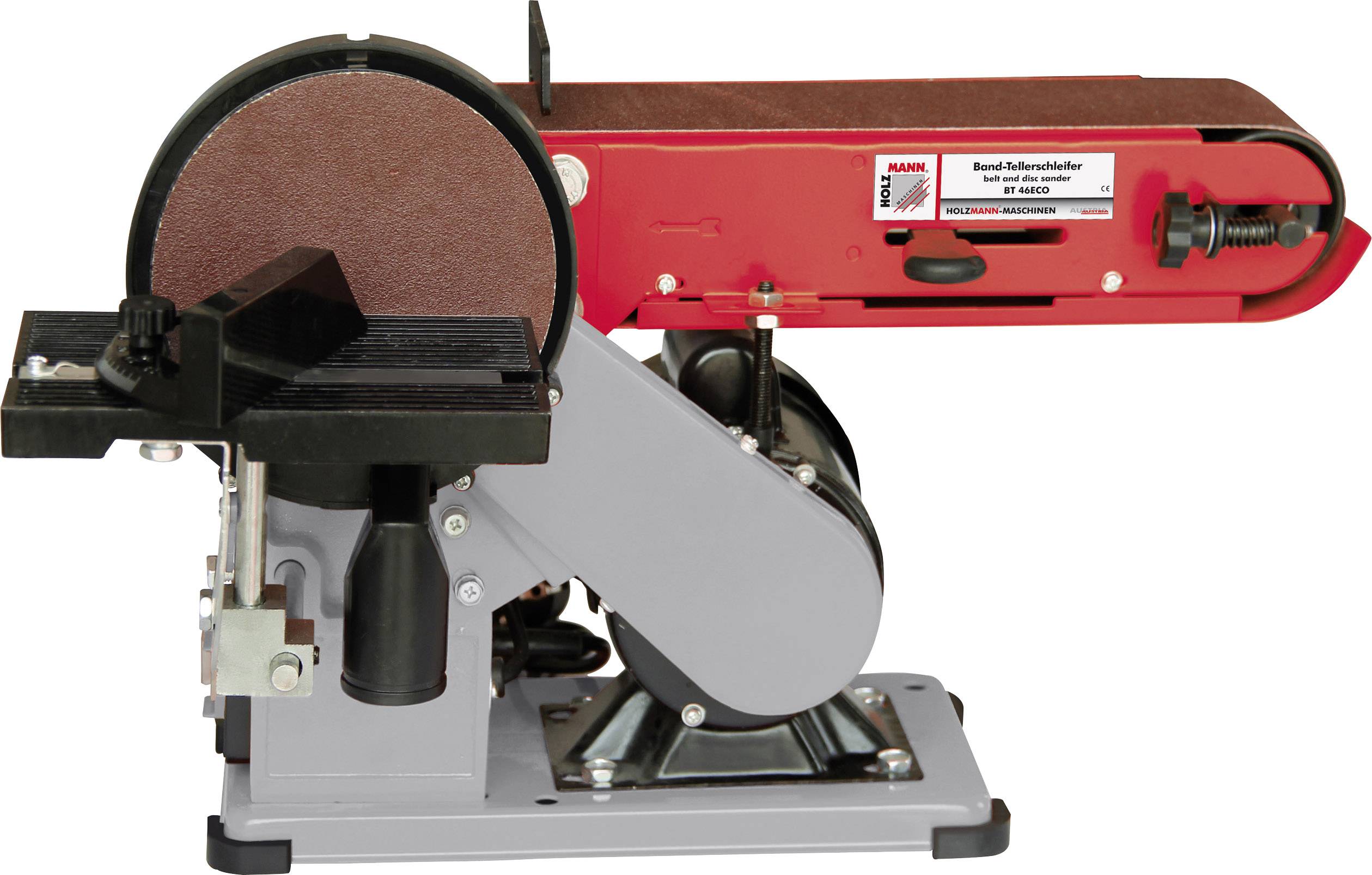 A belt sander with a grey casing and red sanding belt. On the left is a circular grinding disc. The device stands on a metal base.