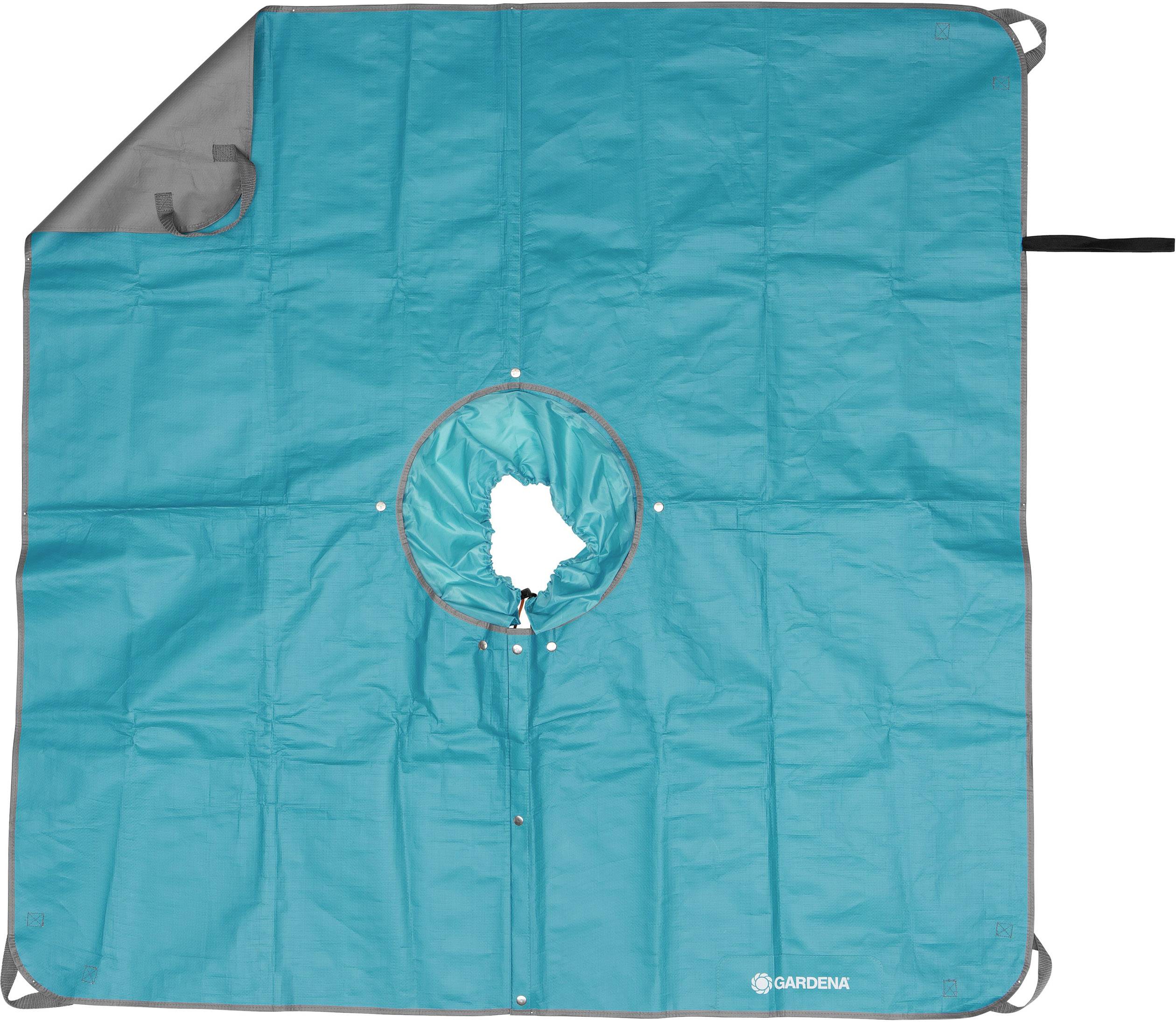 A section of a blue tarpaulin with a small central circle for collecting garden waste, spread out on a brown background.