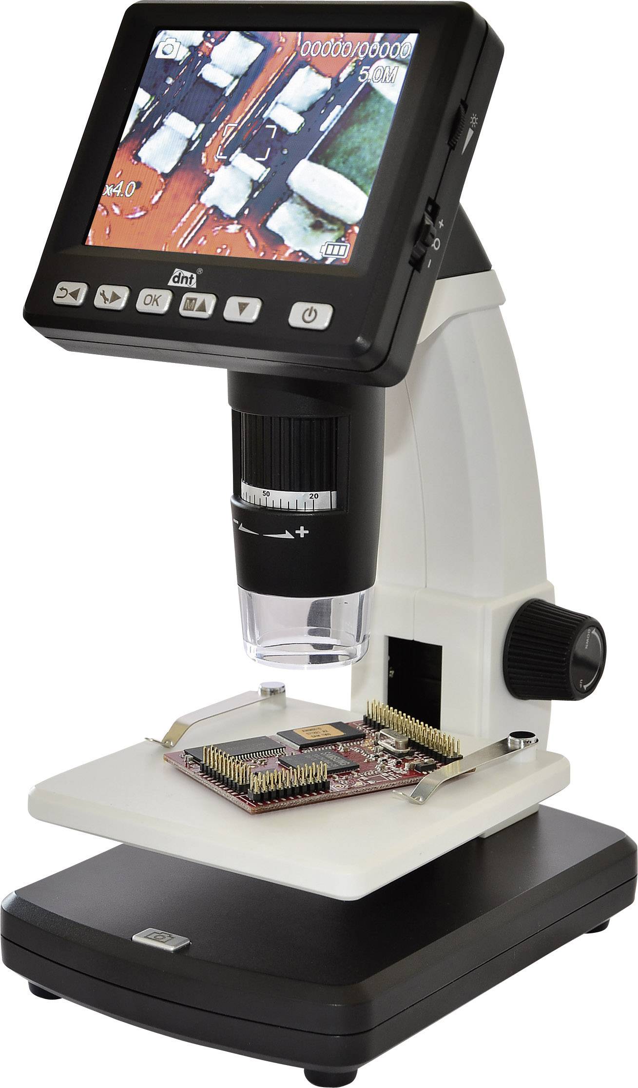 Digital microscope with screen displays an enlarged view of an electronic circuit on a microchip.