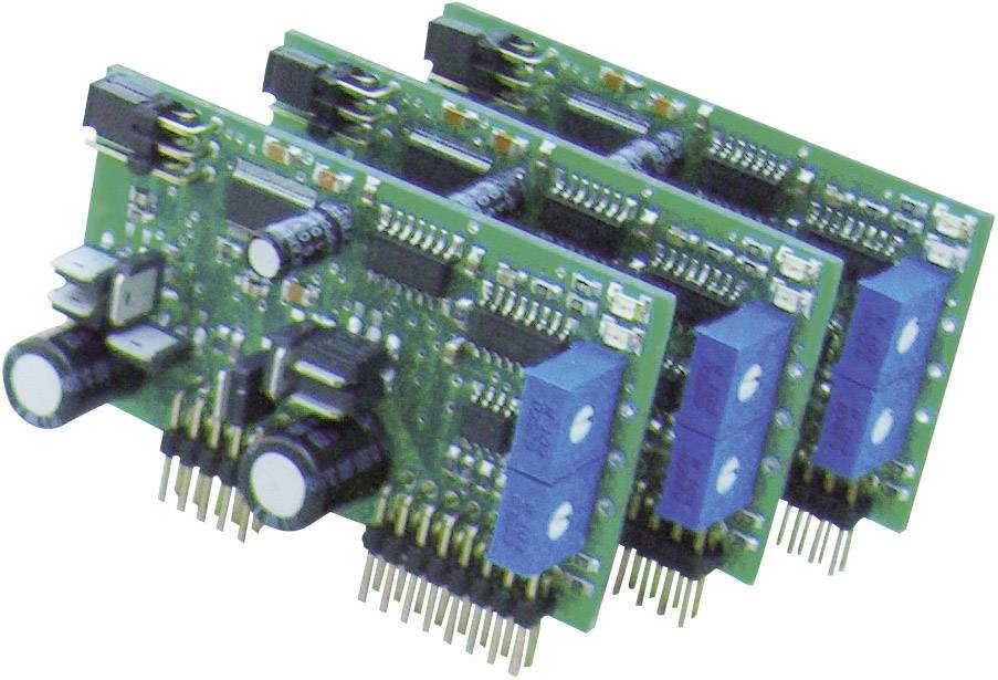 Three green electronic circuit boards with capacitors and plug contacts, arranged in sequence.