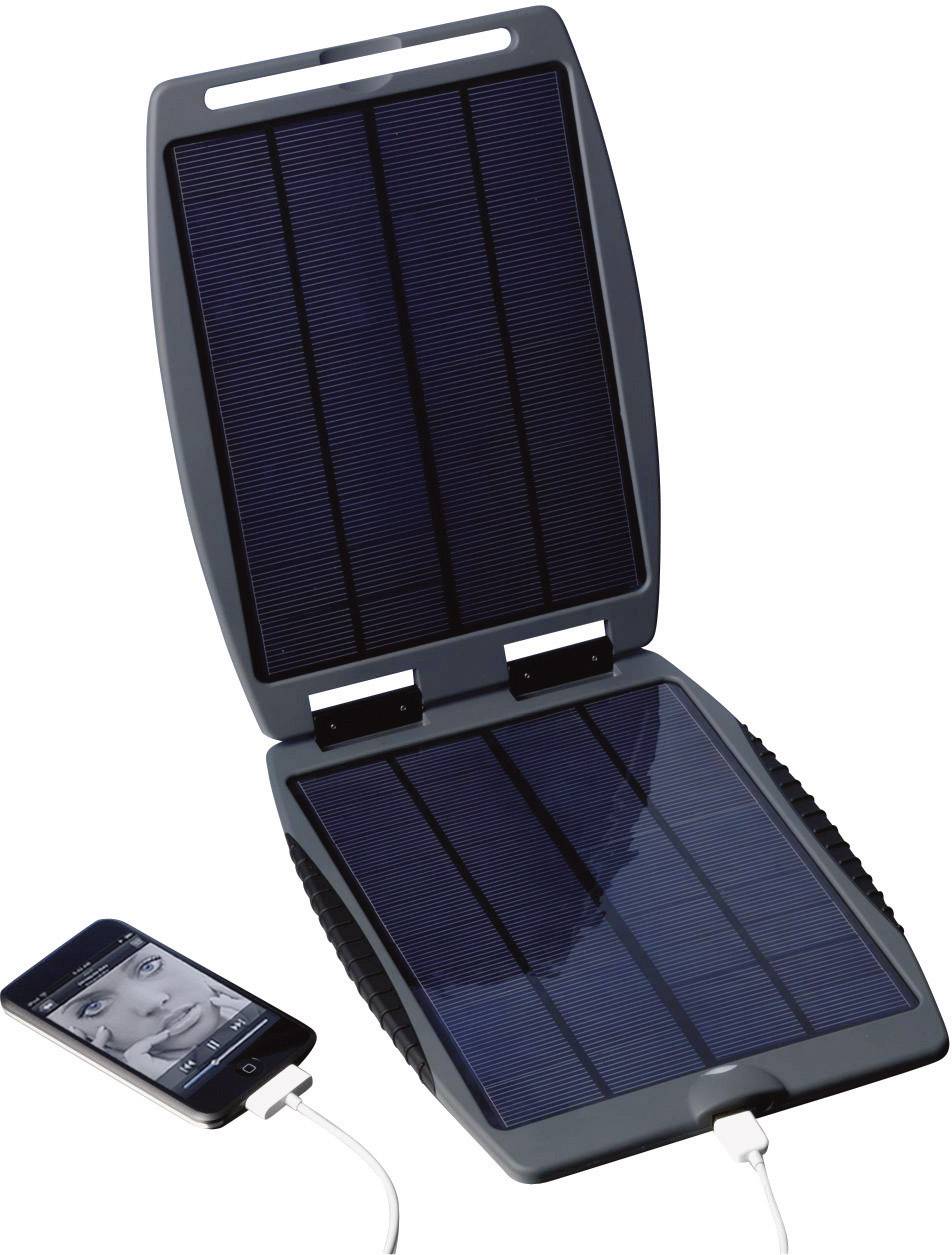 A portable solar panel is charging a smartphone. The device is connected via a cable.