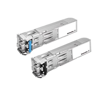 Two silver transceiver modules for network applications. They are rectangular with connectors and have a company logo on the side.