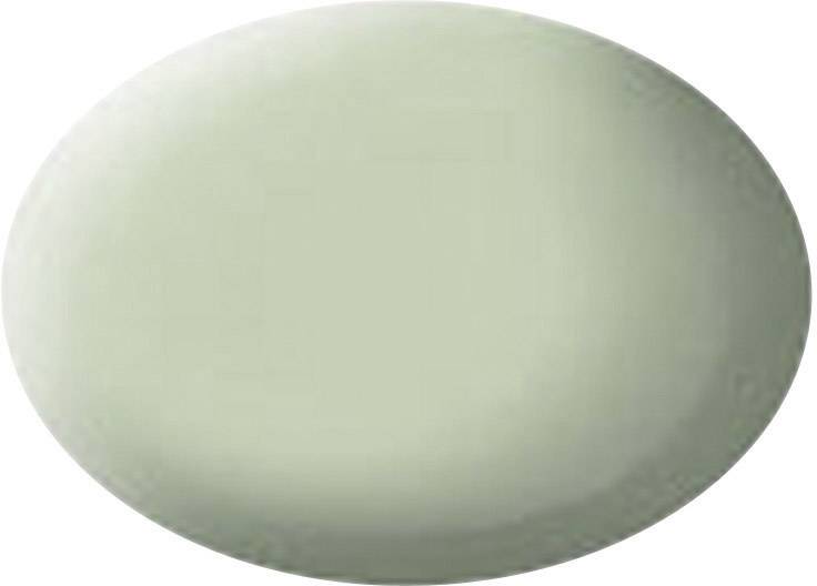 An oval piece of green soap lies on a white background.
