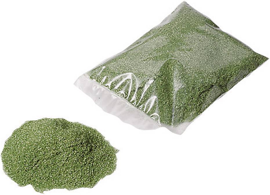A bag of green powder, partly spilled beside it.