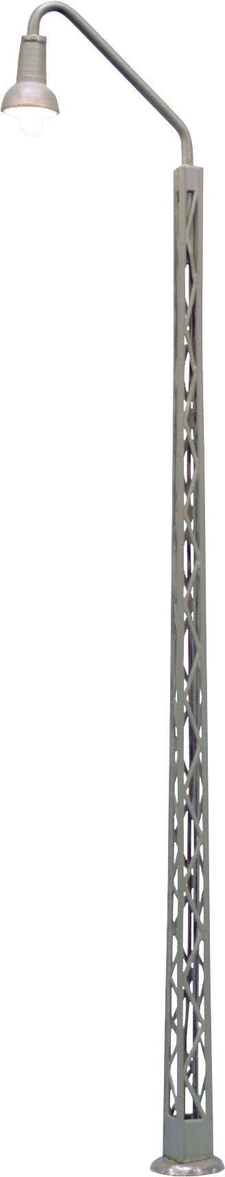 A modern street lamp with a lattice column design and a curved lamp arm.