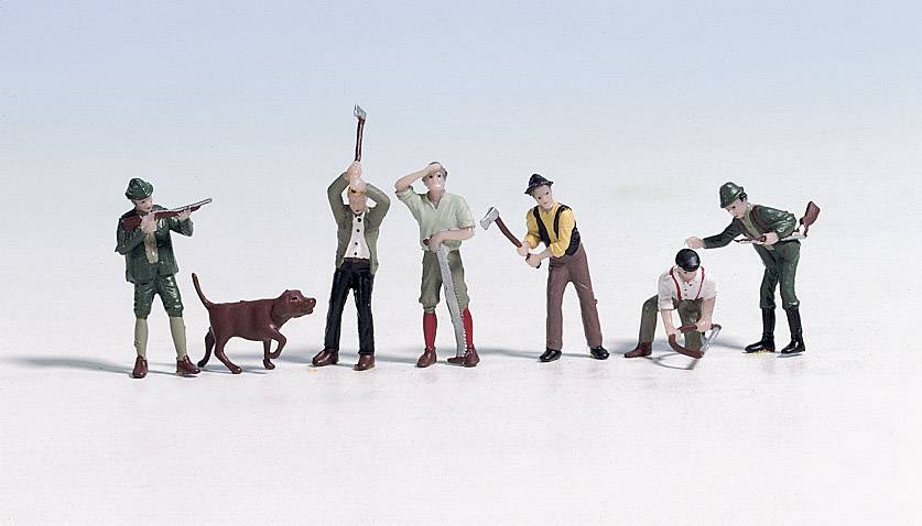 Six miniature figures in hunting gear with a dog pose. Two are holding rifles, one is shooting, others are raising axes, another is kneeling.