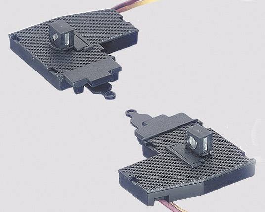 Two black, rectangular electronic sensors with cables, on a light background.