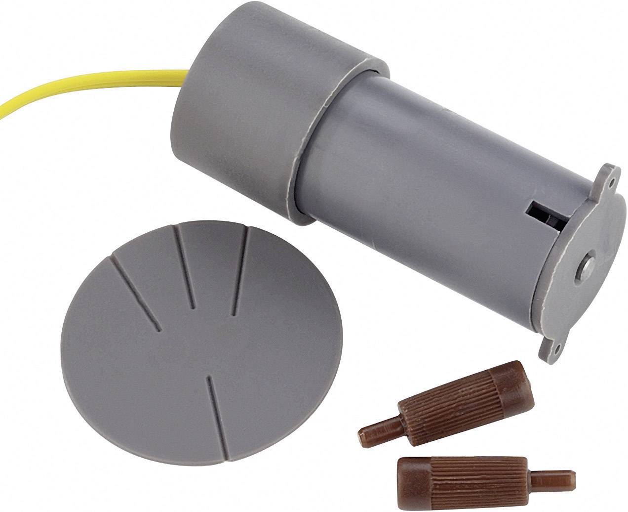 Grey cylindrical motor with a yellow cable, alongside a round cover and two brown connector plugs. Suitable for technical applications.