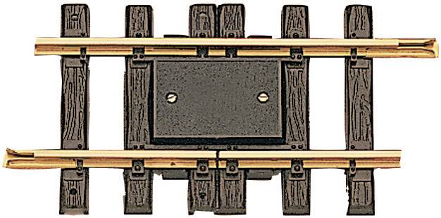 Model railway track switch made of wood and metal, centrally mounted on a rail section. Suitable for changing rail electrical circuits.