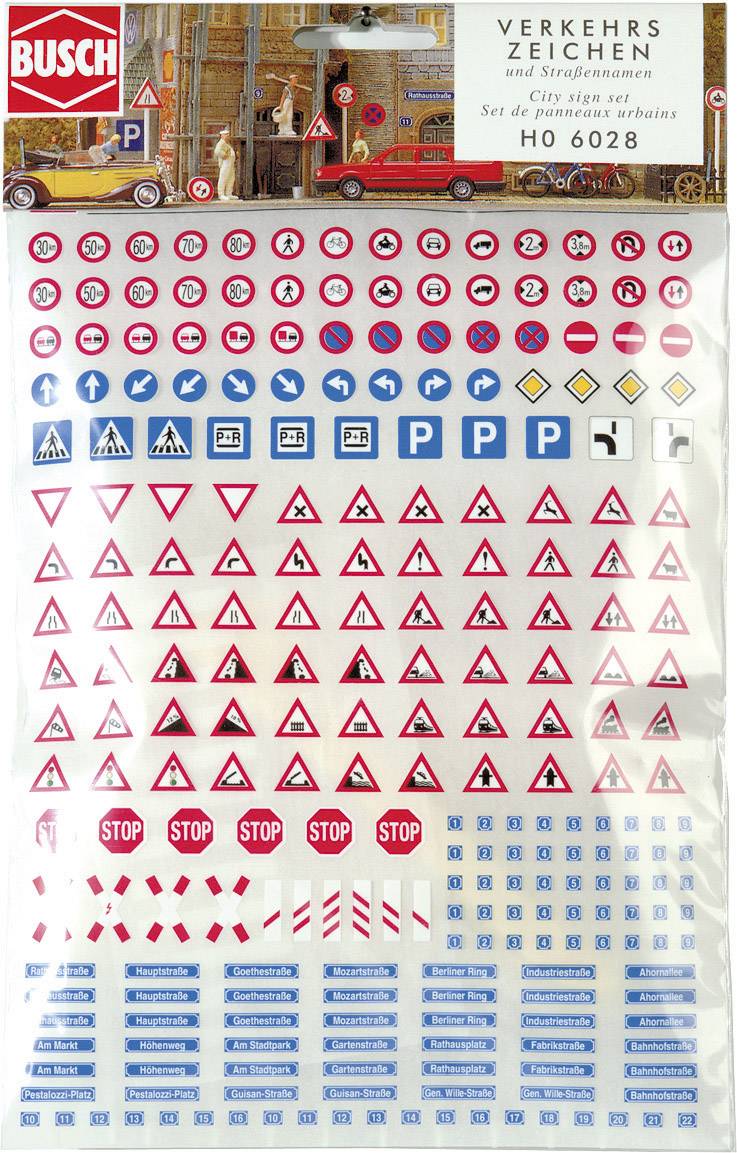 A set of various miniature traffic signs and street name signs in red, blue, and white. Includes stop signs, parking signs, and various warning signs.