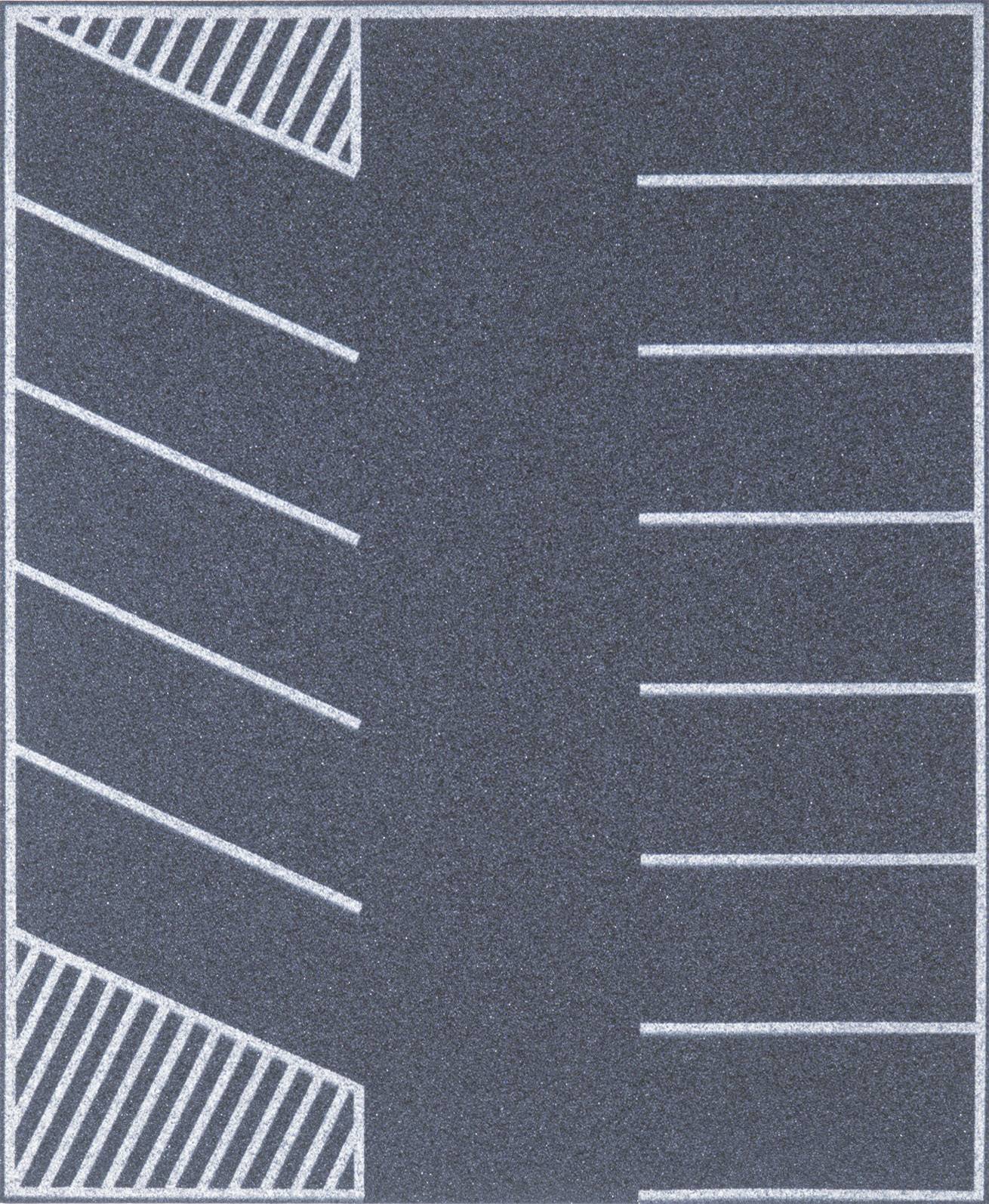 An empty multi-storey car park with marked parking spaces: diagonal parking spaces on the left, parallel parking spaces on the right. No vehicles are visible.