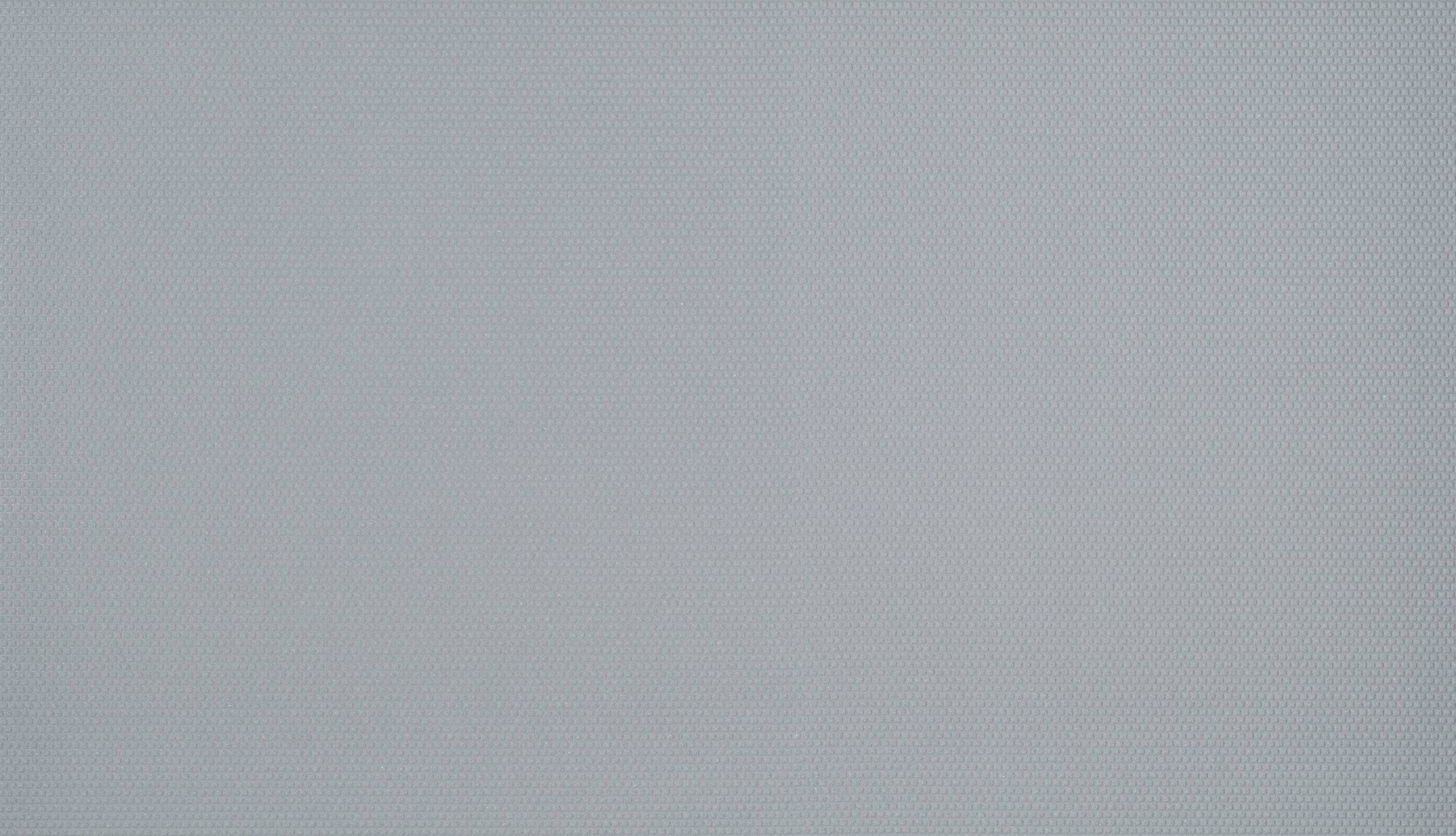 A light grey background with a textured surface.