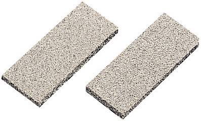 Two beige grinding stones side by side, rectangular and flat, with a grainy surface, for fine grinding work.