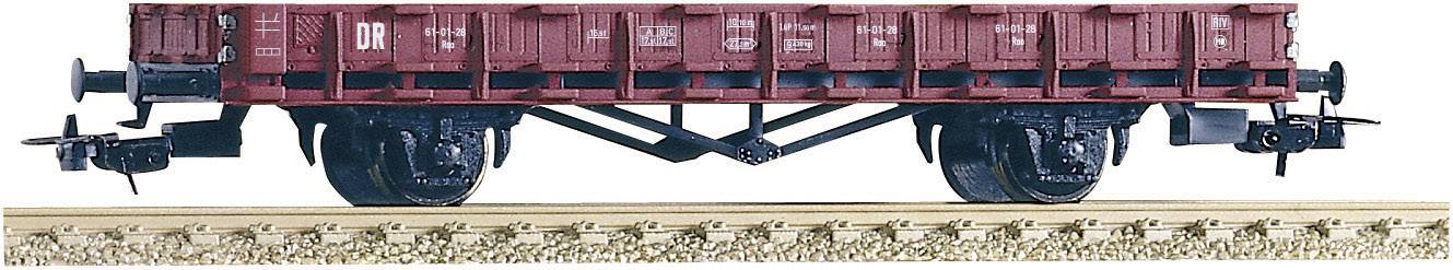 Model railway goods wagon, red with Deutsche Bahn logo, on railway track section. Detailed reproduction of the original, suitable for collections or model railway layouts.
