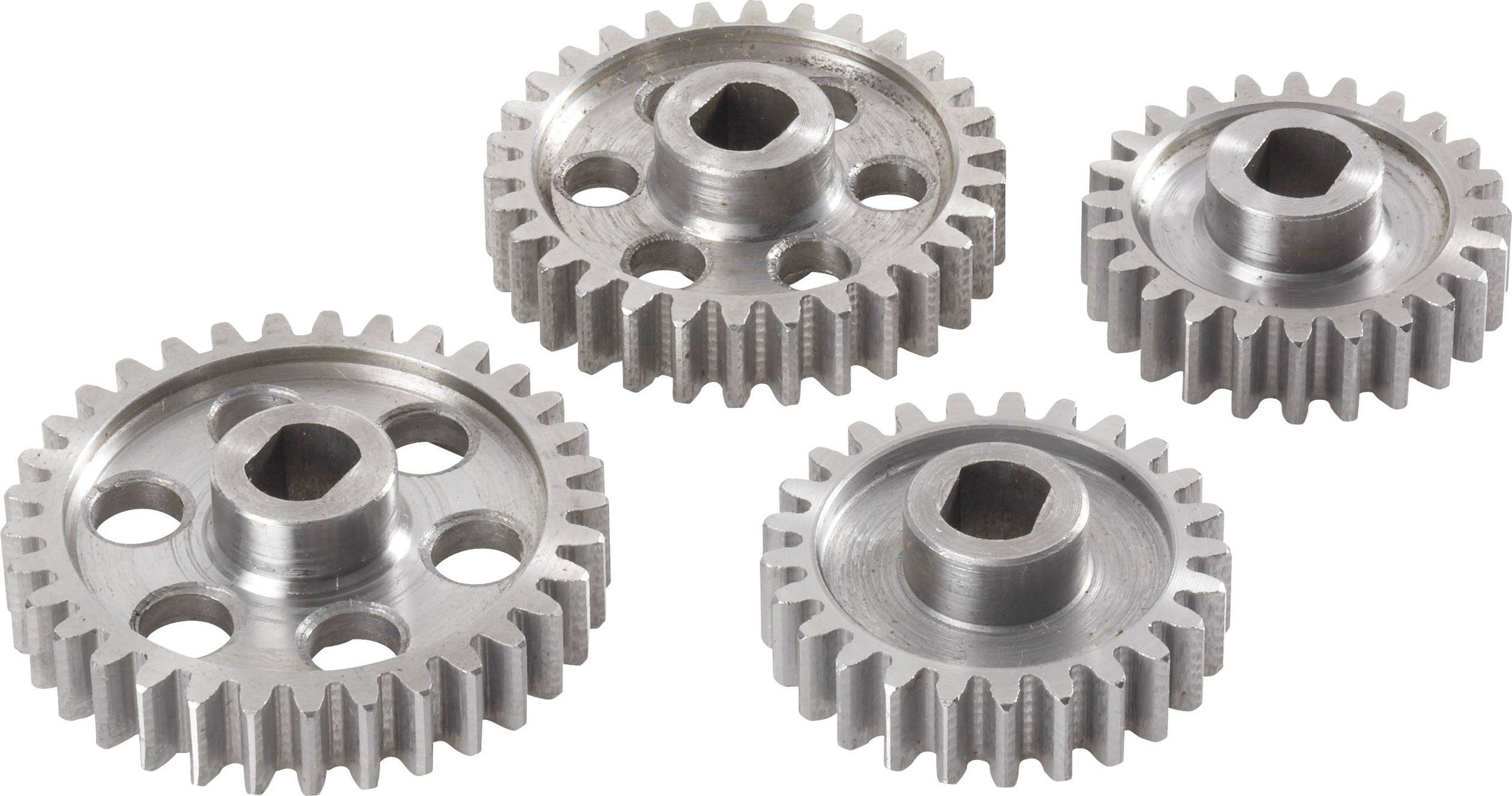 Four interlocking metal gears of different sizes, illustrating the principle of motion transmission.