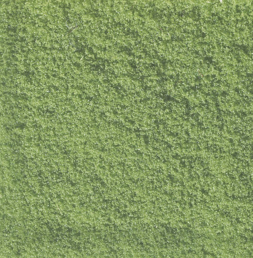 A close-up of artificial grass that is uniformly textured.