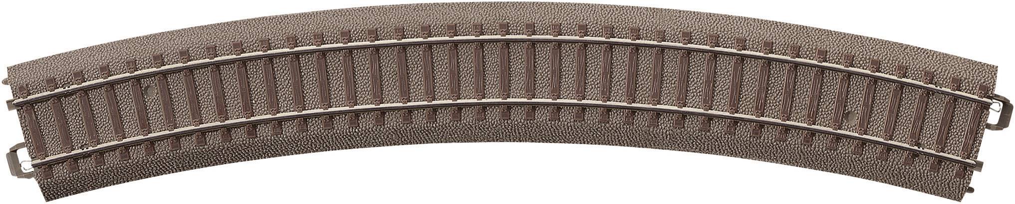 Curved model railway track with wooden sleepers and metal rails, showing a gentle curve for model train layouts.